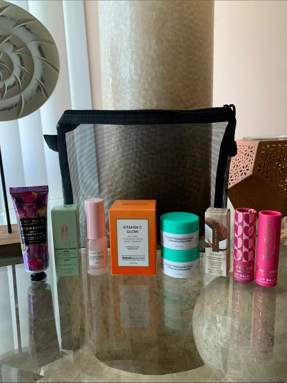 Assorted Skincare & Lip Balms with Black Mesh Cosmetic Pouch